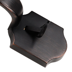 Detailed view of the wave lever handle in oil-rubbed bronze finish
